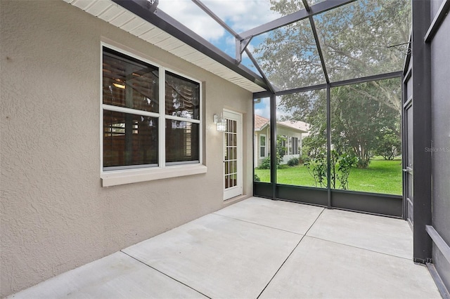 unfurnished sunroom with a healthy amount of sunlight