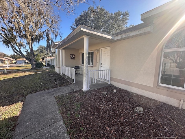 property entrance with a porch