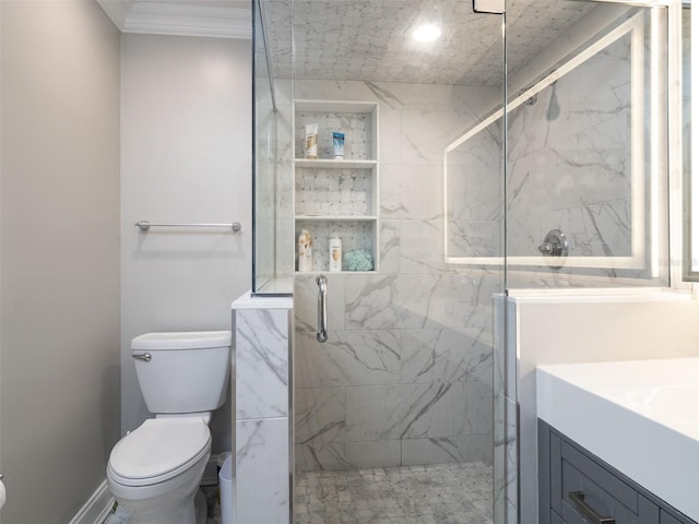 bathroom with an enclosed shower, crown molding, vanity, and toilet