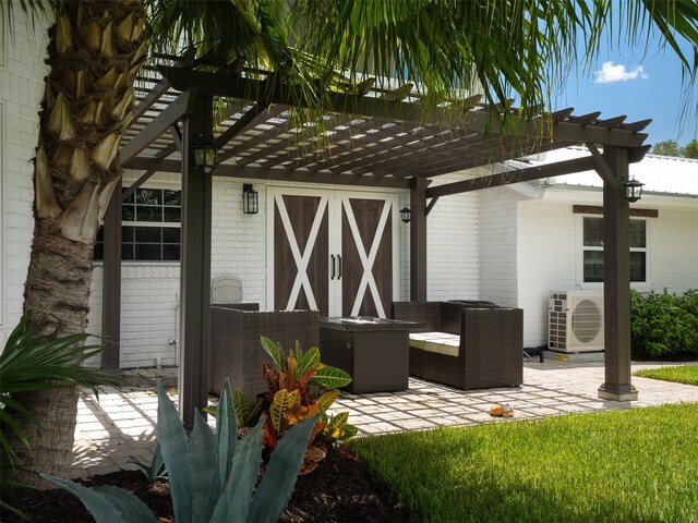 exterior space featuring an outdoor hangout area and a pergola