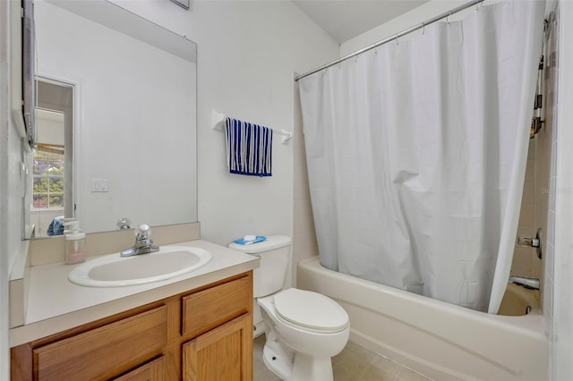 full bathroom featuring shower / tub combo, vanity, tile patterned floors, and toilet