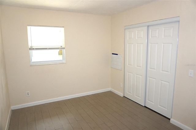 unfurnished bedroom featuring a closet