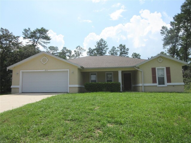 ranch-style home with a front yard and a garage