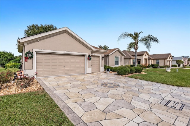 ranch-style home with a garage and a front yard