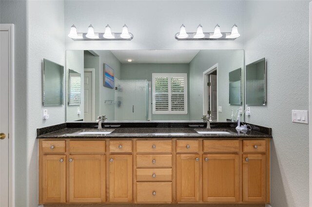 bathroom with dual vanity