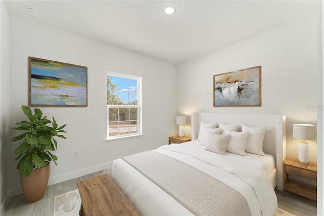 bedroom featuring light wood-type flooring