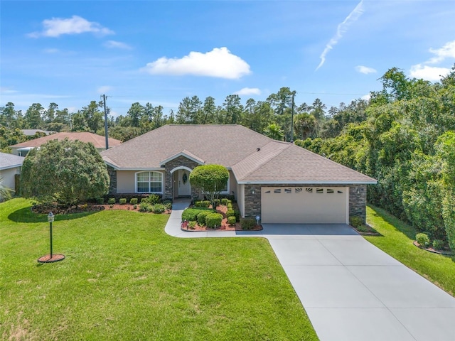 ranch-style home with a garage, concrete driveway, a front lawn, and stone siding