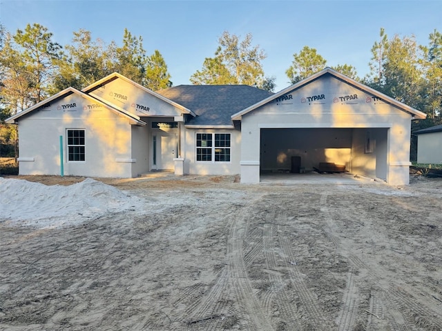 view of front of property featuring a garage