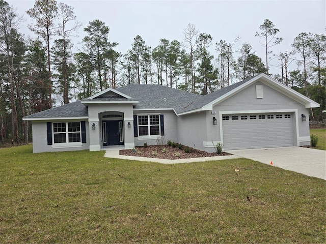 ranch-style house with a garage and a front yard