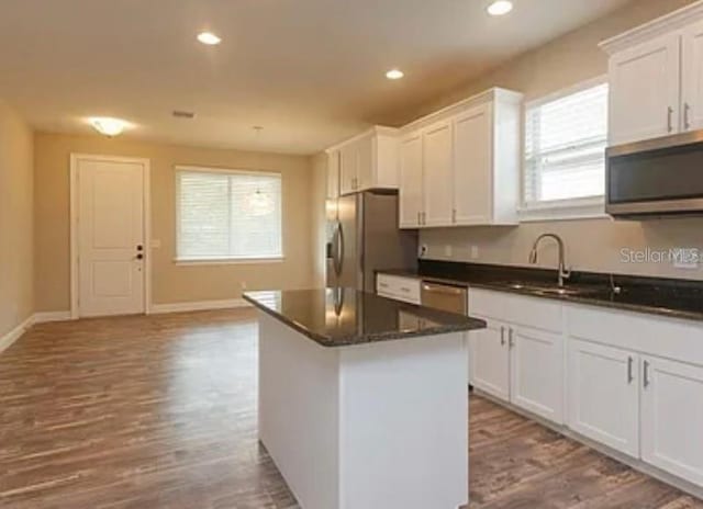 0 Fisher Lane Way, Ocklawaha, FL 32179 - kitchen featuring stainless steel appliances, healthy amount of natural light, white cabinets, and recessed lighting