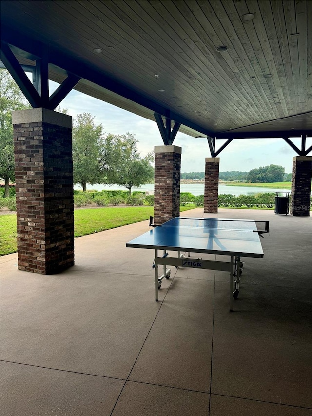 view of patio / terrace with a water view