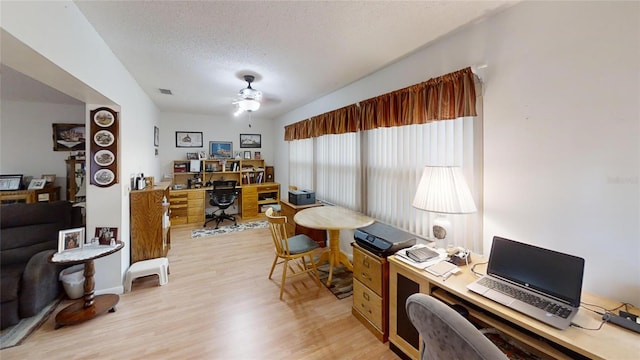 office area featuring ceiling fan, a textured ceiling, and hardwood / wood-style flooring