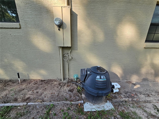 exterior details featuring electric meter