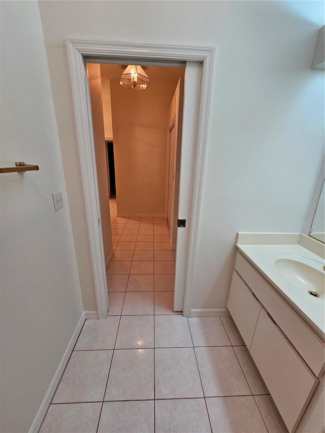 bathroom featuring tile patterned floors and vanity