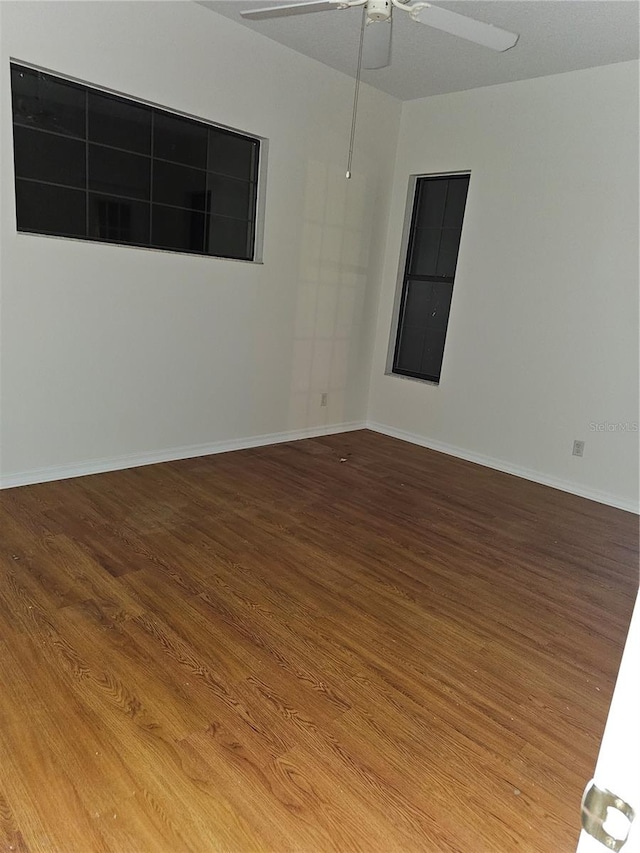 unfurnished room with ceiling fan and light hardwood / wood-style flooring