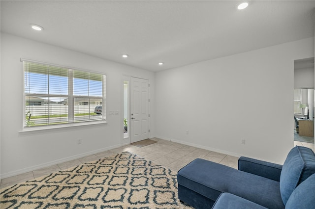 living room with light tile patterned floors