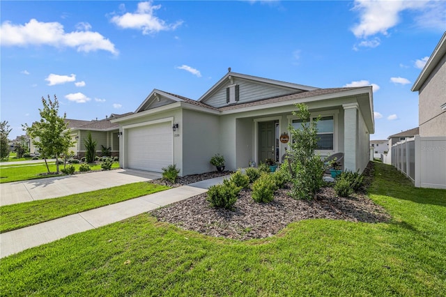 view of front facade with a garage and a front yard