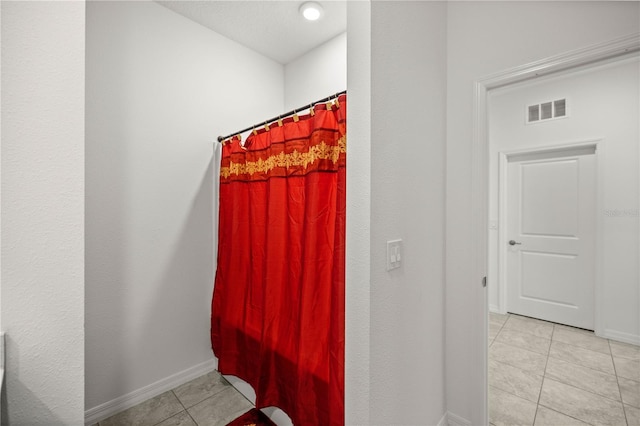 bathroom featuring tile patterned floors