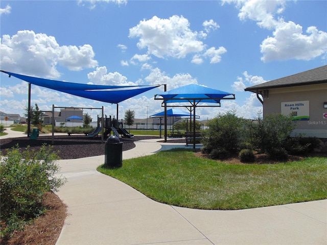 view of playground featuring a lawn