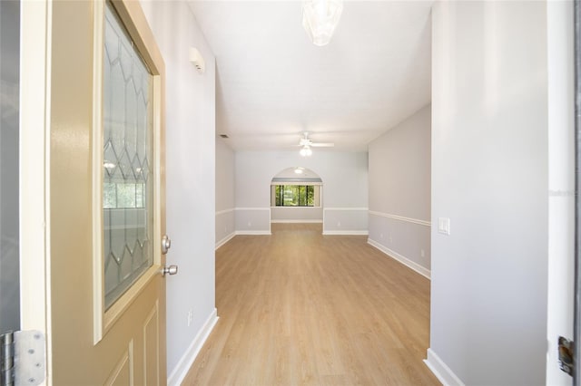 hallway with light wood-type flooring