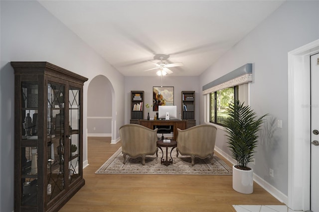 dining room with light hardwood / wood-style flooring and ceiling fan