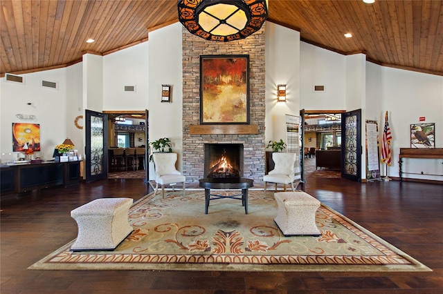 living room featuring a fireplace, dark wood-type flooring, high vaulted ceiling, and wood ceiling