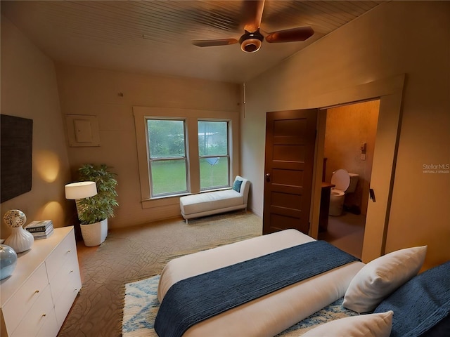 carpeted bedroom featuring ceiling fan, lofted ceiling, and a closet