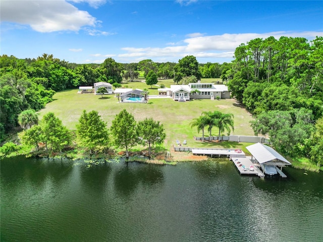 birds eye view of property with a water view