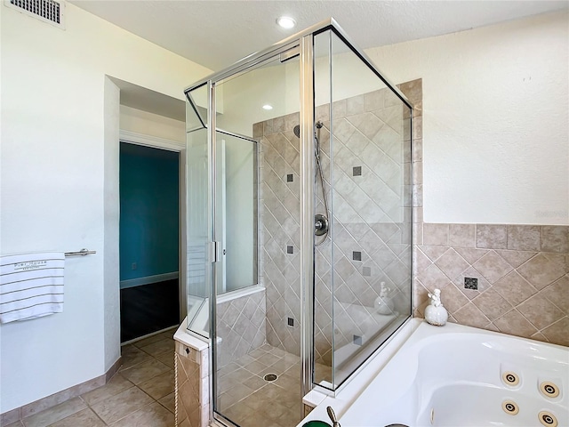 bathroom featuring shower with separate bathtub and tile patterned floors