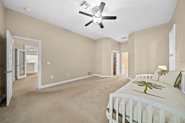 bedroom with light carpet and ceiling fan