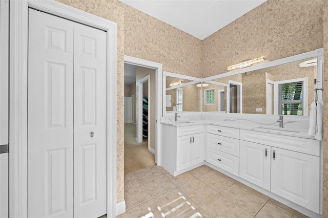 bathroom with vanity and tile patterned flooring