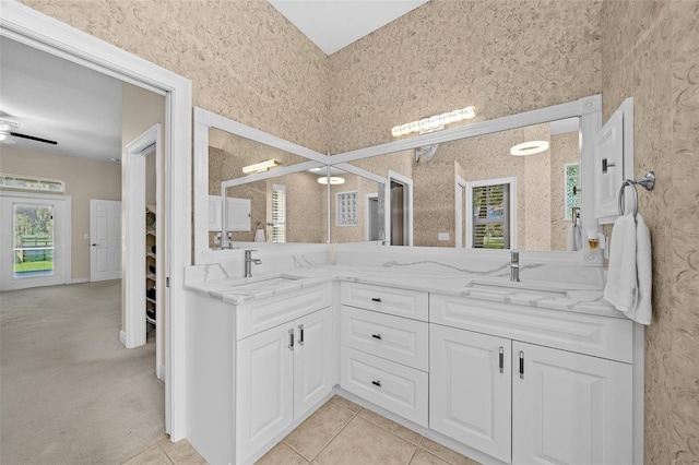 bathroom featuring tile patterned floors and vanity