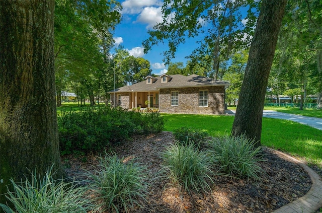 exterior space featuring a front lawn