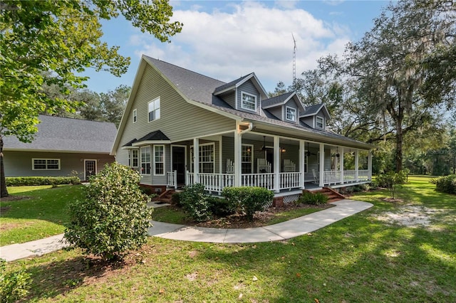 view of front of property featuring a front lawn and a porch