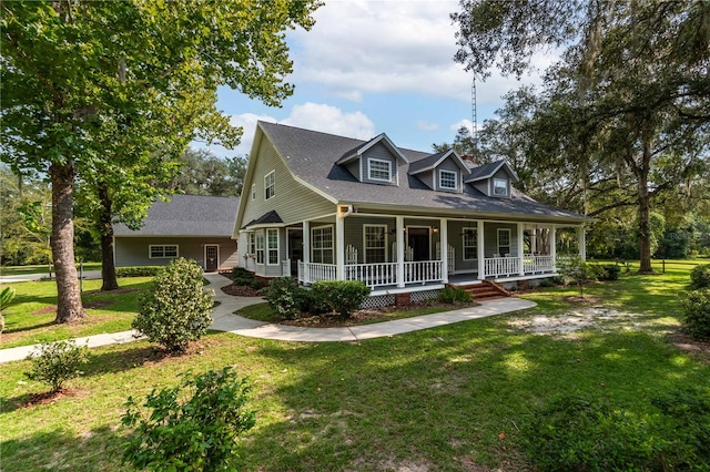 cape cod house featuring a front yard and a porch