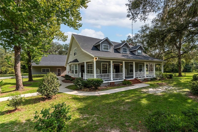 farmhouse featuring a porch and a front lawn