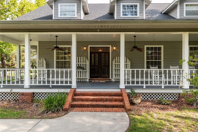 property entrance featuring a porch and ceiling fan