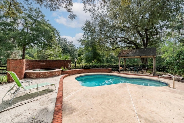 view of pool with a gazebo, a fenced in pool, an in ground hot tub, and a patio