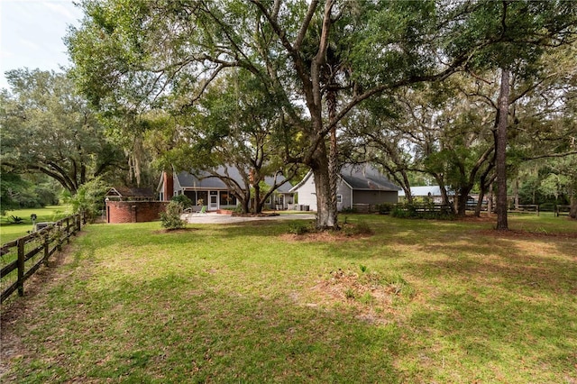 view of yard with fence