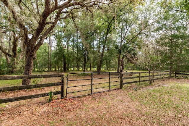 view of yard with a gate and fence