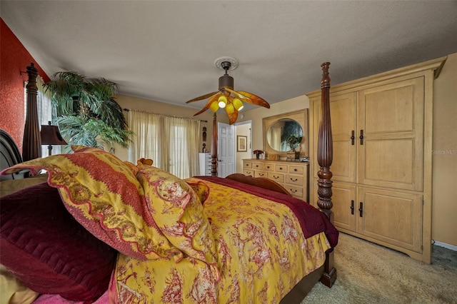 bedroom with ceiling fan and light colored carpet