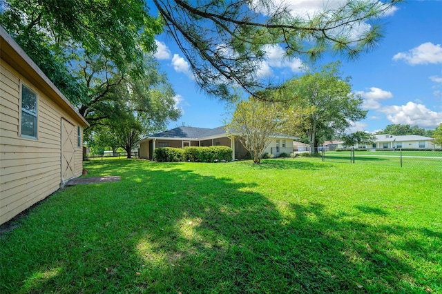 view of yard featuring fence