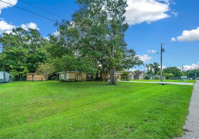 view of yard featuring fence