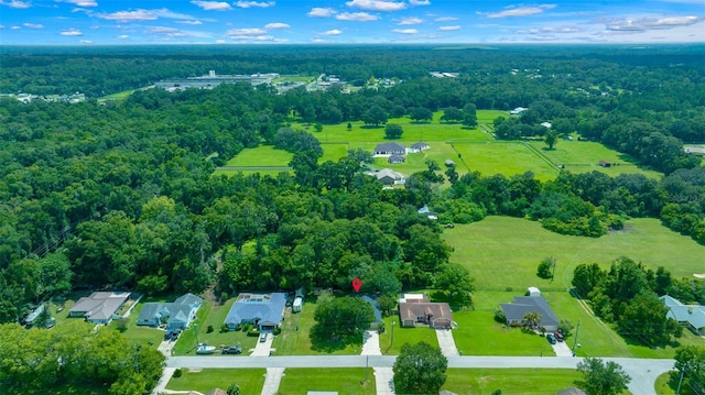 aerial view with a forest view and a residential view