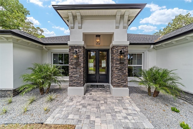 doorway to property featuring french doors