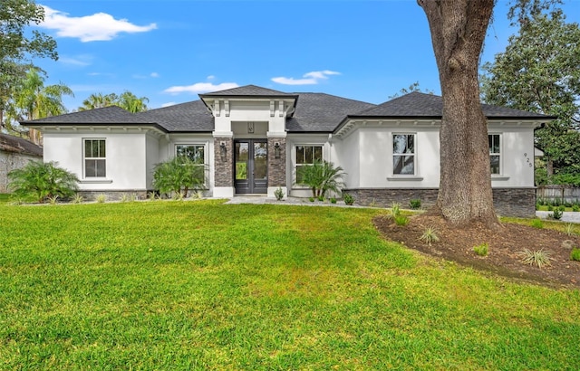 prairie-style house with a front lawn