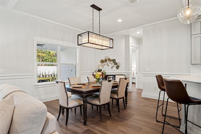 dining space featuring dark hardwood / wood-style flooring