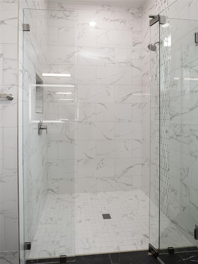 bathroom with walk in shower