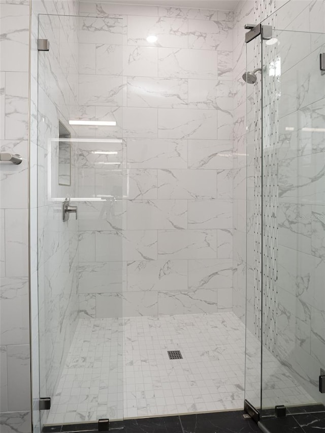 full bathroom with a shower stall
