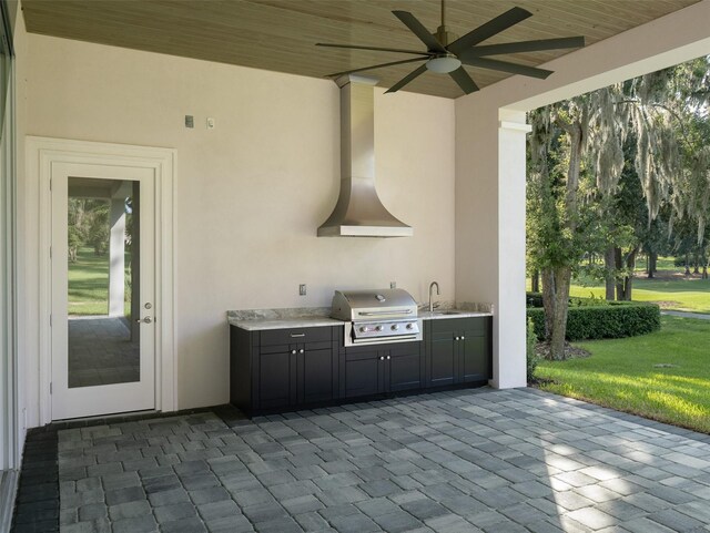 view of patio featuring ceiling fan, sink, grilling area, and area for grilling